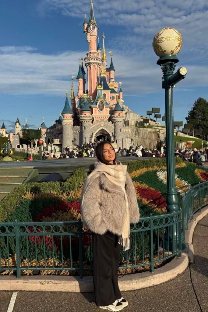 Grey Shaggy Faux Fur Coat + Cream Plaid Scarf + Black Wide Leg Trousers + White and Black Chunky Sneakers