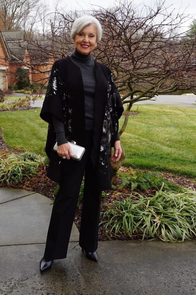 Grey Turtleneck Sweater + Black Wide Leg Trousers + Black Sequin Embellished Wrap + Silver Hard Shell Clutch