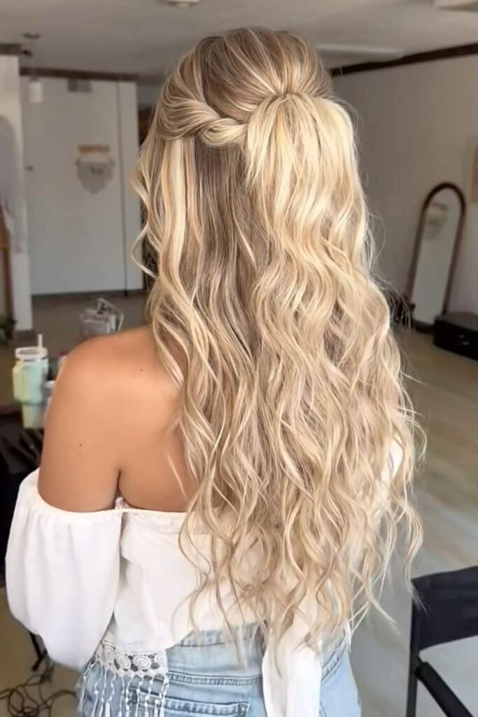 High Half-Up Ponytail with Twisted Side Pieces and Long Waves