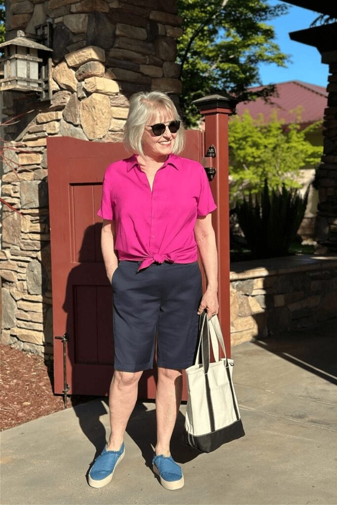 Hot Pink Tie Front Short Sleeve Button Up + Navy Blue Bermuda Shorts + Blue Fringed Slip On Loafers