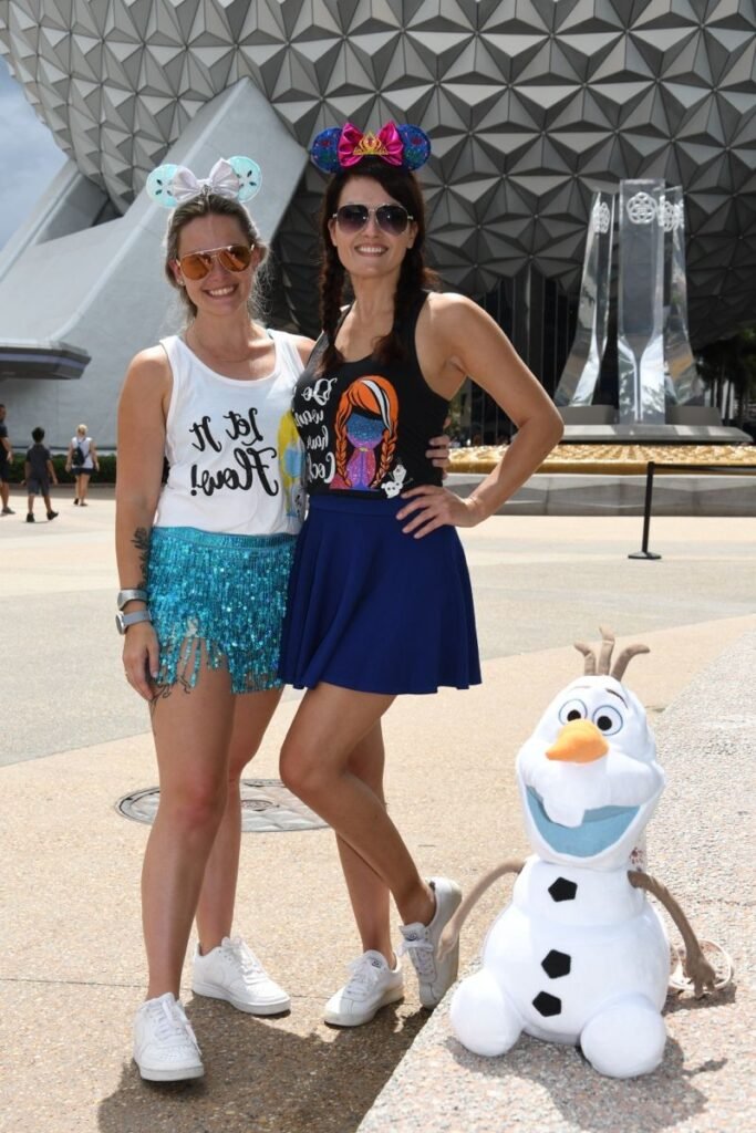 Left: Let It Flow Graphic Tank Top + Aqua Blue Sequin Fringe Shorts + White Sneakers