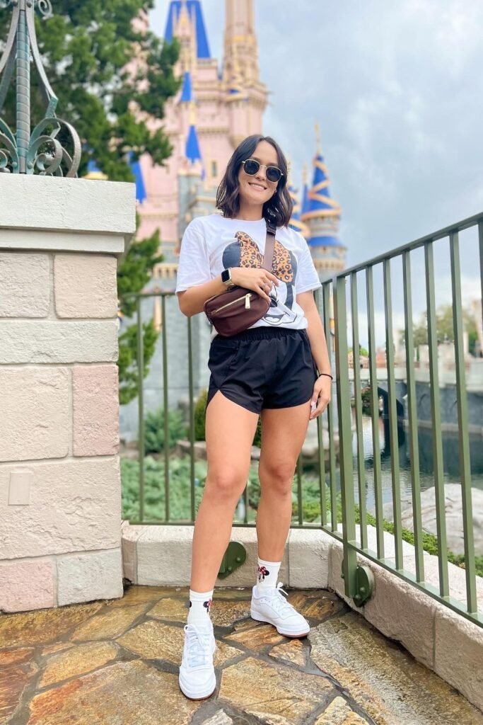 Leopard Minnie Mouse Tee + Black Athletic Shorts + White Sneakers with Mickey Socks