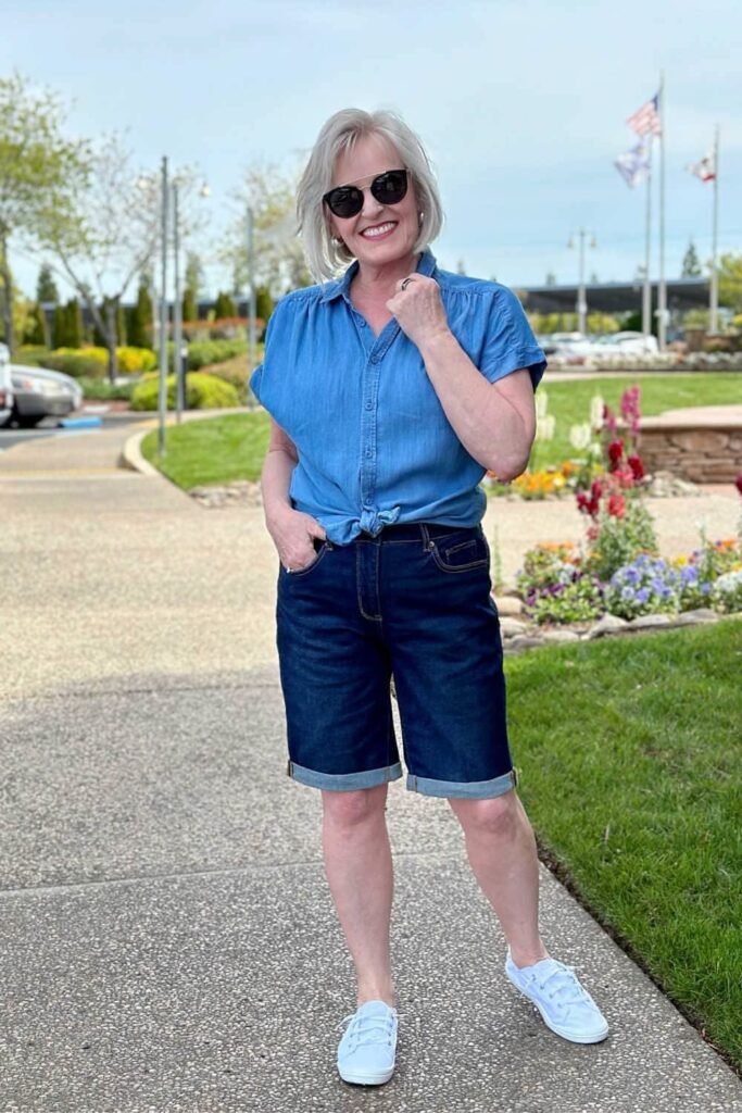 Light Wash Denim Tie Front Short Sleeve Shirt + Dark Wash Cuffed Denim Bermuda Shorts + White Canvas Sneakers