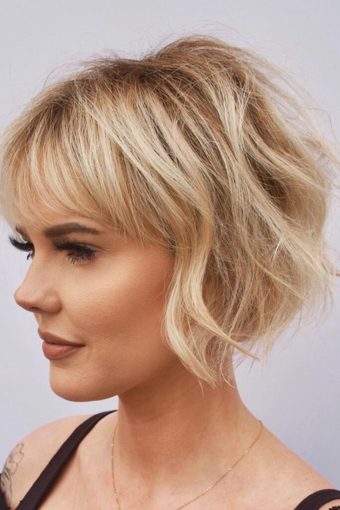 Messy Blonde Wavy Bob with Wispy Full Fringe