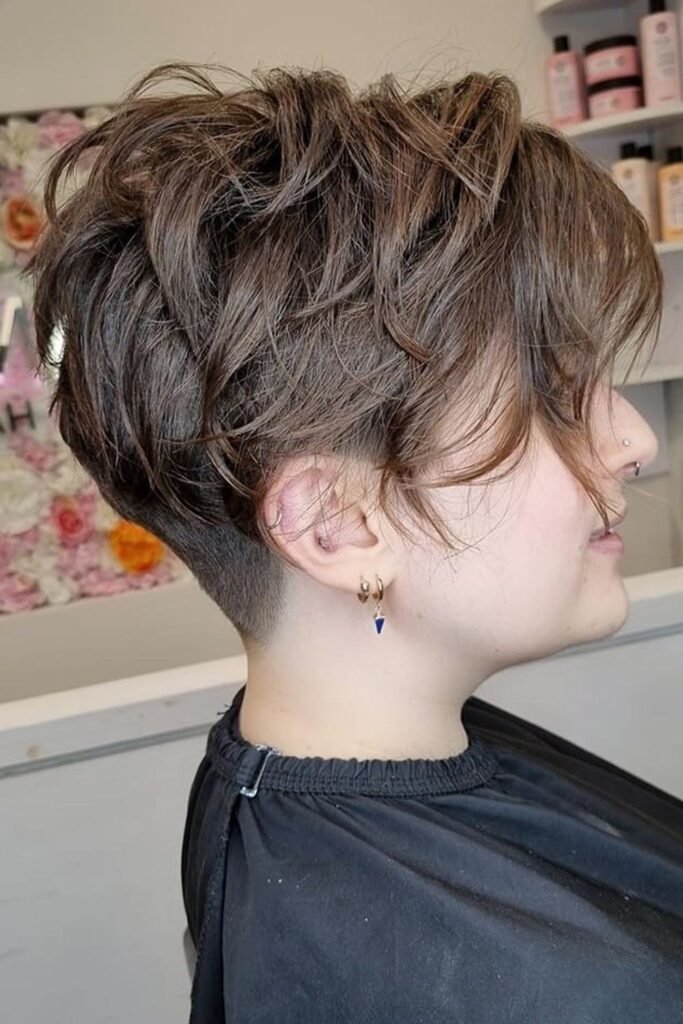 Messy Brunette Pixie Cut with Shaved Undercut