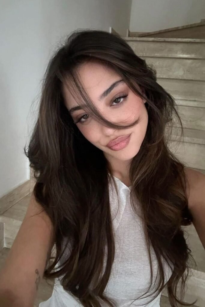 Messy Long Layered Hair with Long Curtain Bangs