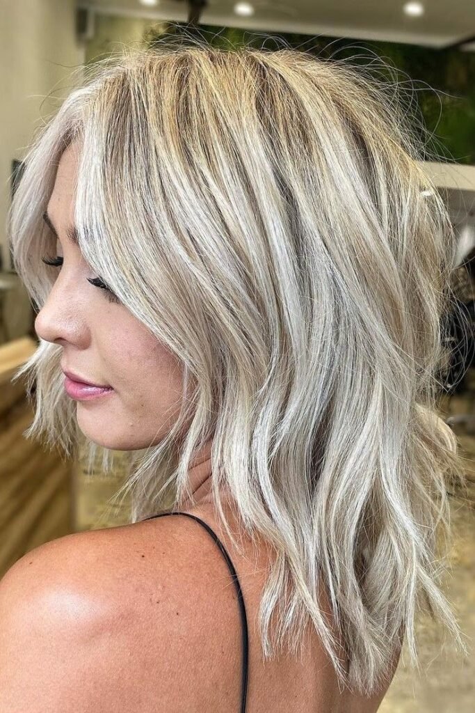 Messy Textured Lob with Bright Face-Framing Strands