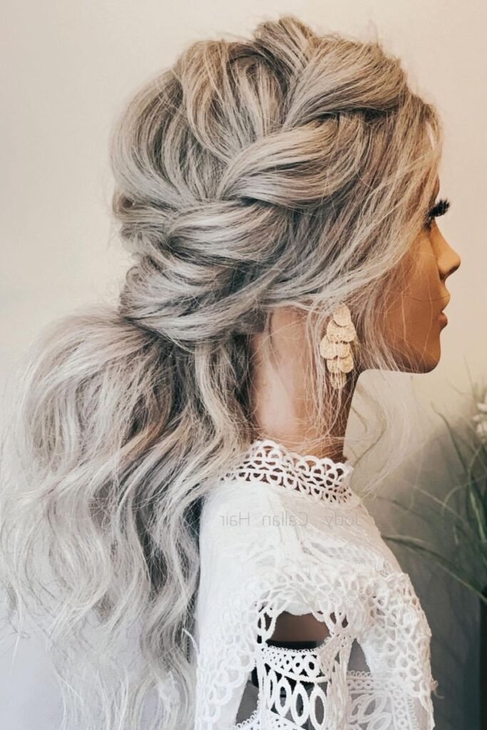 Messy Textured Low Ponytail with Side French Braid in Ash Blonde