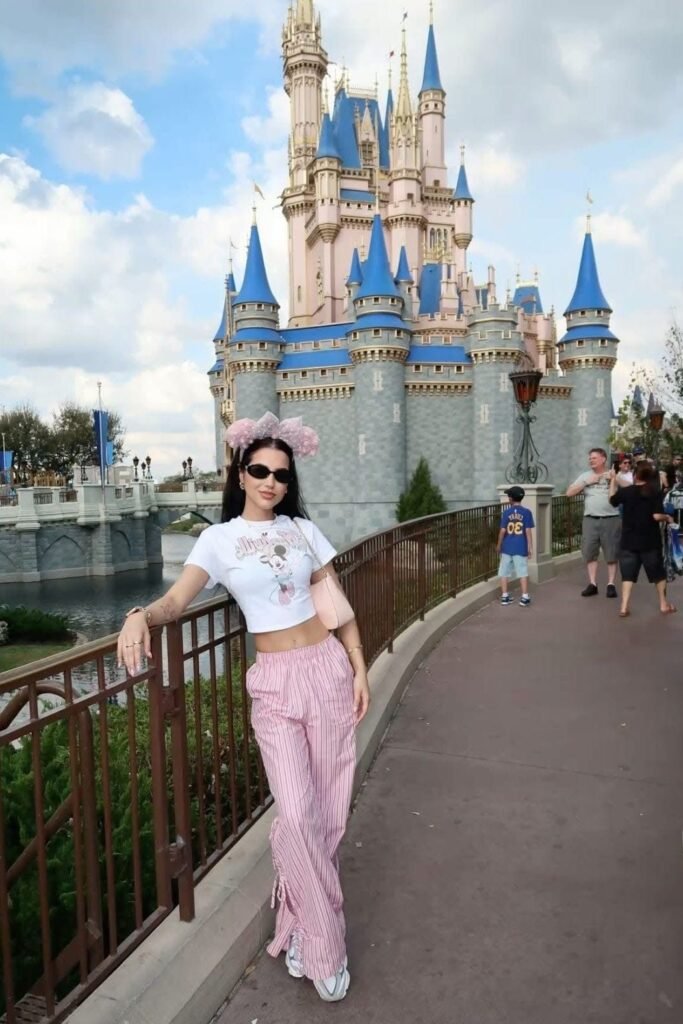 Minnie Mouse Graphic Baby Tee + Pink Striped Cargo Pants + White Sneakers