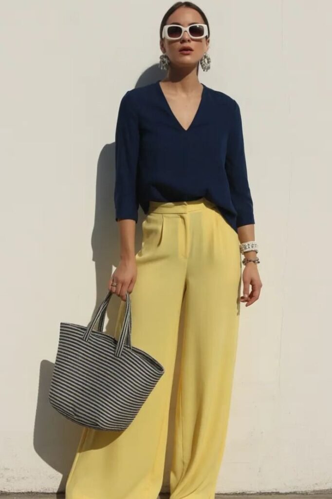 Navy Blue V Neck Blouse + Pale Yellow Wide Leg Trousers + Striped Tote Bag