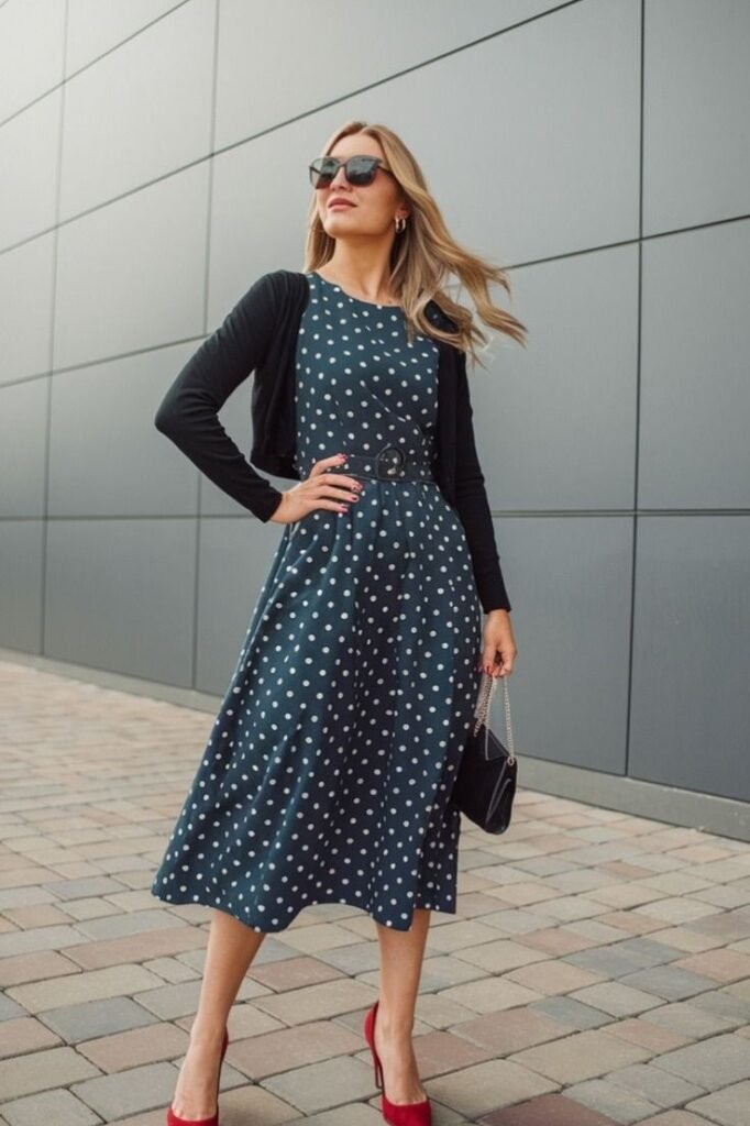 Navy Polka Dot Midi Dress + Black Cropped Cardigan + Red Suede Pumps