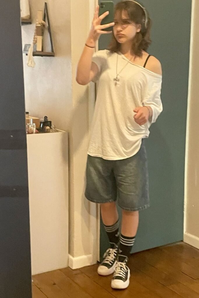 Off-the-Shoulder White Tee + Denim Jorts + Black High-Top Sneakers