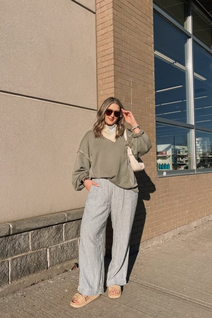 Olive Green Oversized Sweatshirt + Black and White Striped Wide Leg Pants + Beige Double Strap Sandals