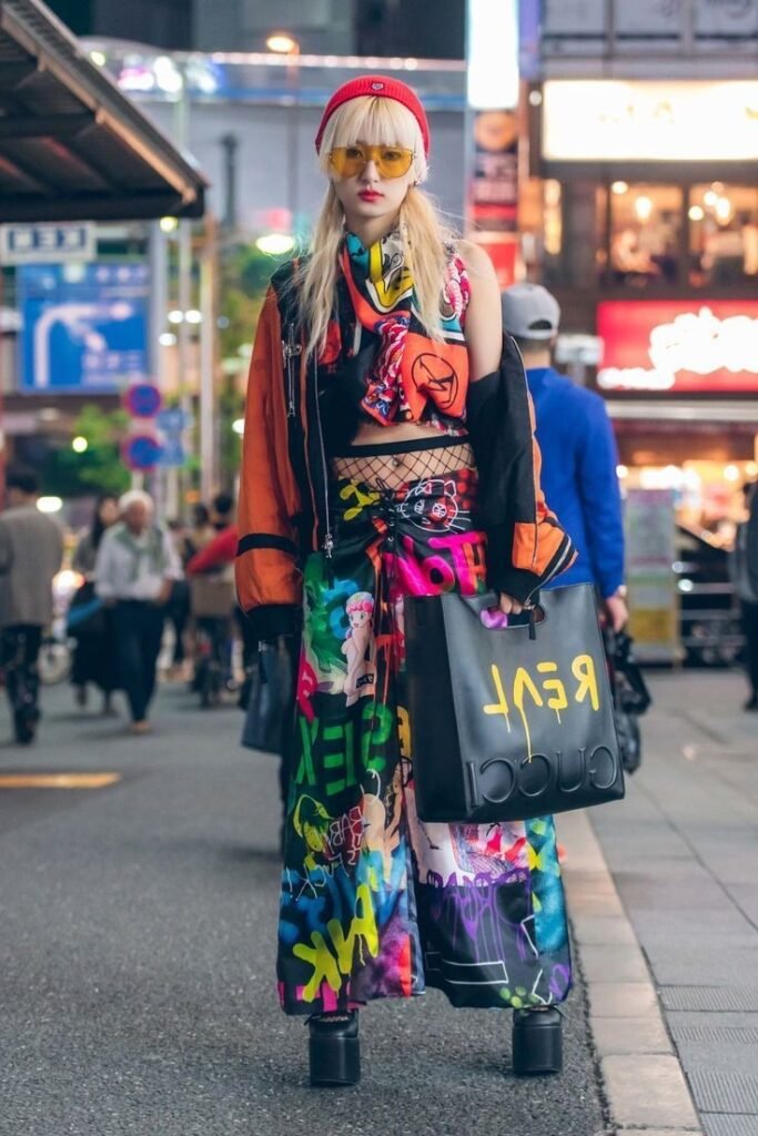 Orange Bomber Jacket + Multicolor Graffiti Wide Leg Pants + Black Platform Boots