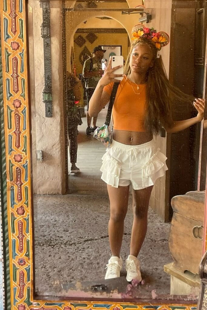 Orange Crop Top + White Ruffled Shorts + White Sneakers