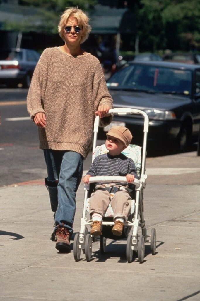 Oversized Beige Knit Sweater + Loose Blue Jeans + Brown Hiking Boots