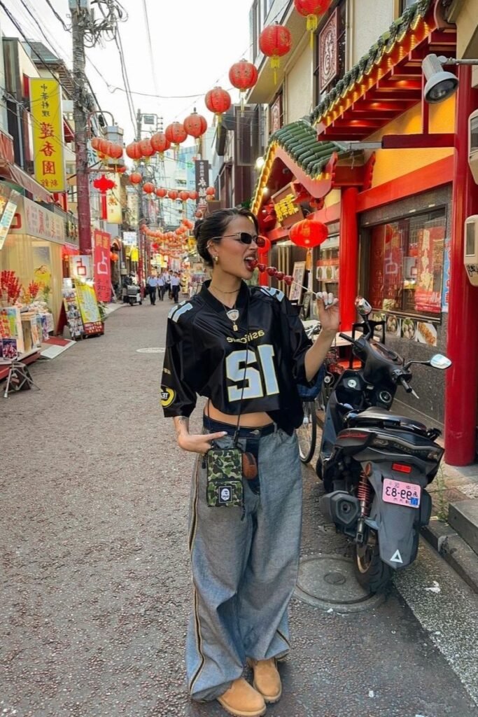 Oversized Black Cropped Jersey + Baggy Blue Jeans + Tan Boots