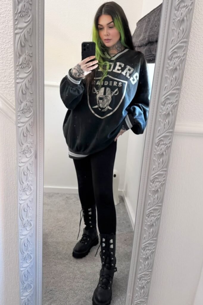 Oversized Black Raiders Sweatshirt + Black Leggings + Tall Black Combat Boots