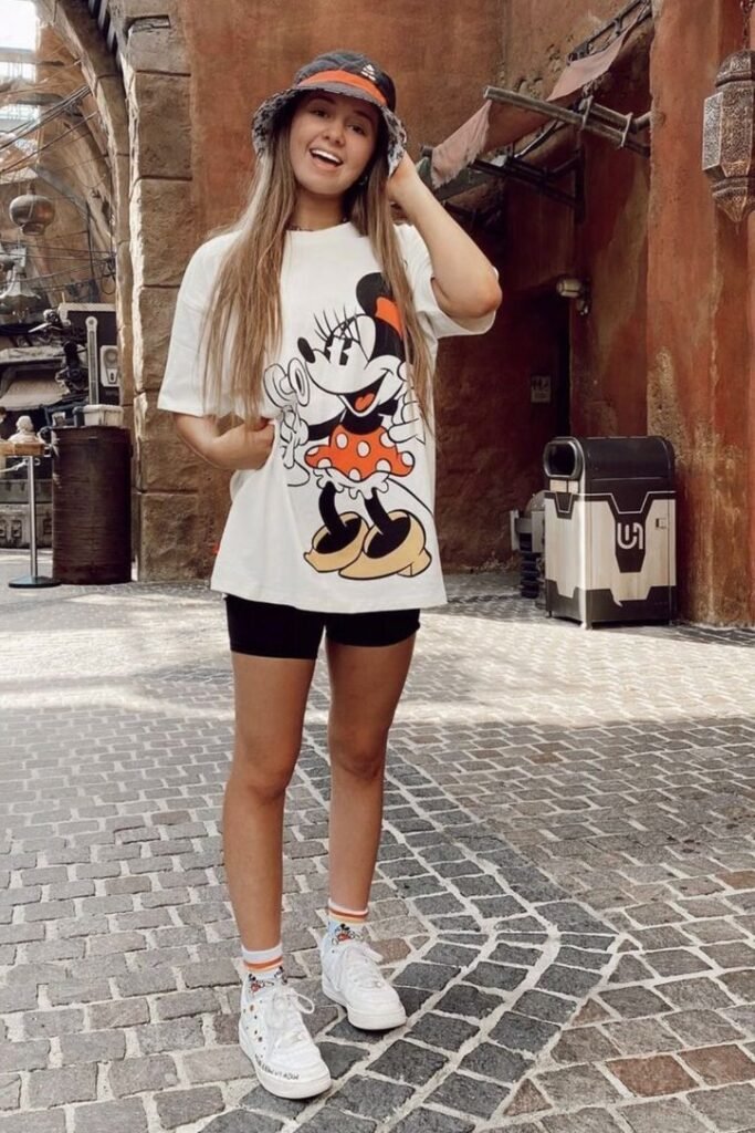 Oversized Minnie Mouse Tee + Black Biker Shorts + White Sneakers