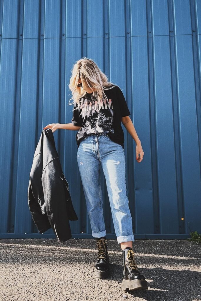 Oversized Nirvana Graphic T Shirt + Light Wash Cuffed Jeans + Black Leather Jacket + Black Platform Combat Boots
