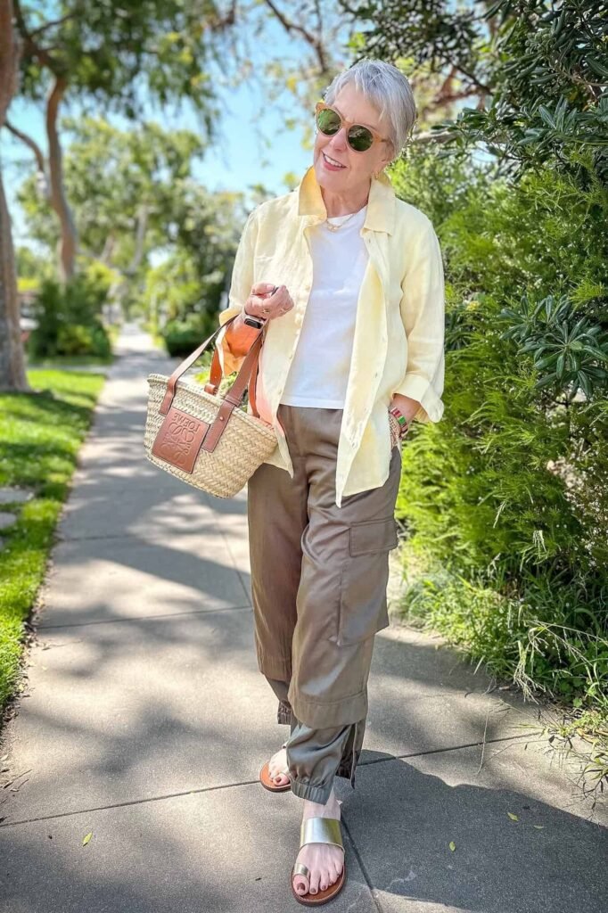Pale Yellow Linen Button Down + White T Shirt + Olive Cargo Joggers + Metallic Slide Sandals