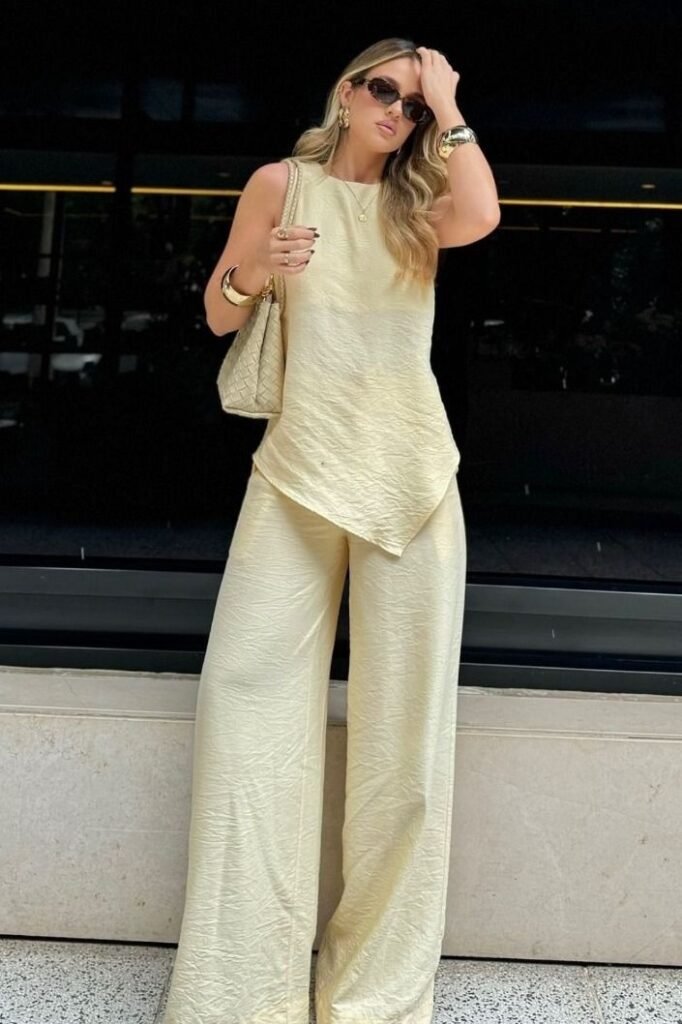 Pale Yellow Sleeveless Textured Top + Matching Wide Leg Trousers + Beige Handbag