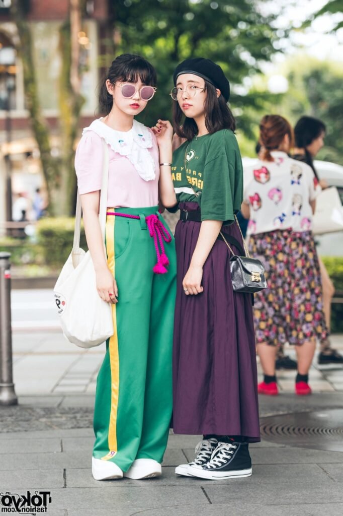 Pink Blouse with Ruffled Collar + Green Wide Leg Trousers + Pink Rope Belt / Oversized Green Graphic T Shirt + Dark Purple Maxi Skirt + Black High Top Sneakers