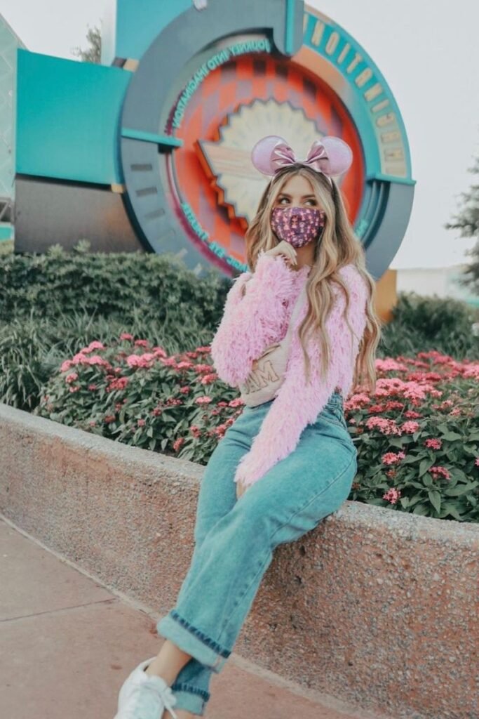 Pink Fuzzy Sweater + Medium Wash Blue Jeans + White Sneakers