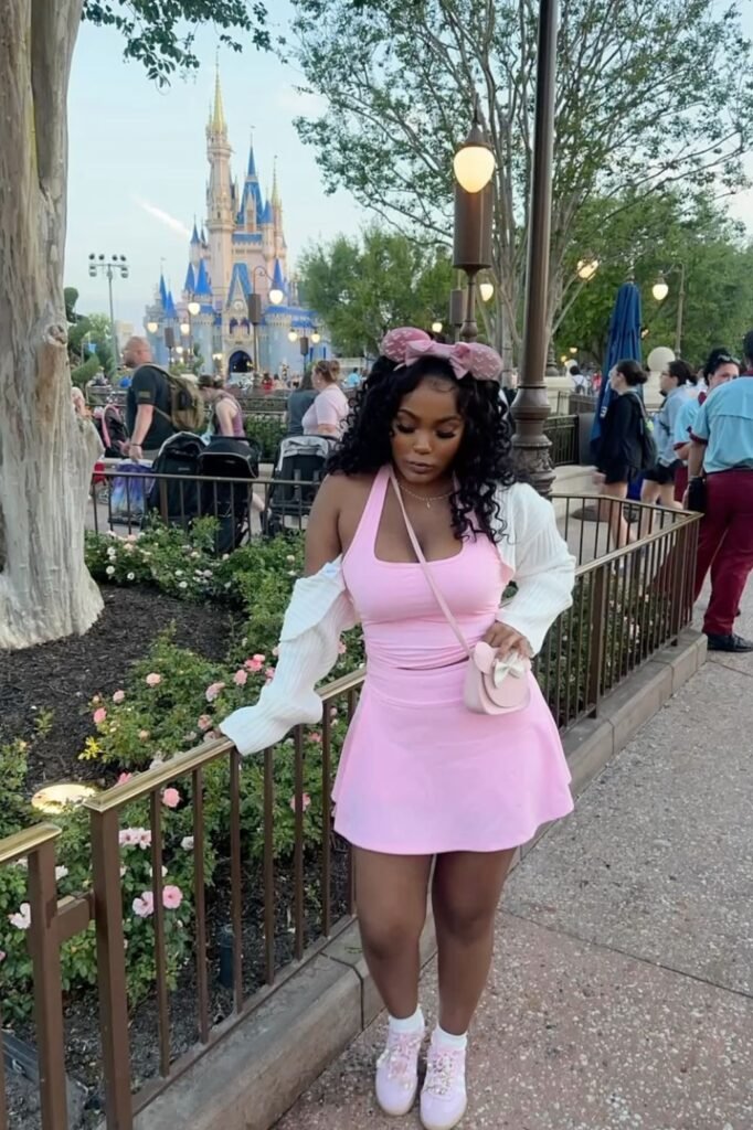 Pink Halter Top + Pink Athletic Mini Skirt + White Shrug Cardigan + Pink Sneakers + Pink Bow Crossbody Bag