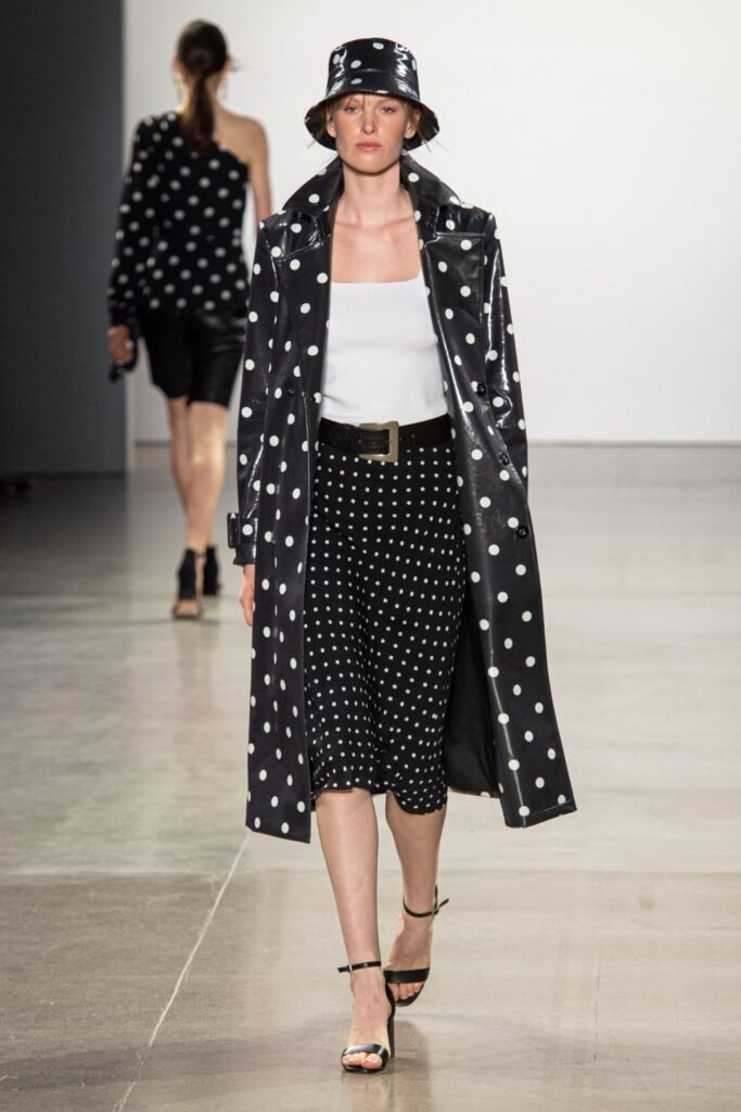 Polka Dot Bucket Hat + Black Polka Dot Trench Coat + White Tank Top + Polka Dot Midi Skirt + Black Ankle Strap Heels