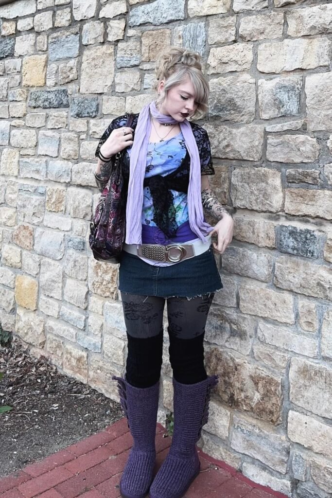 Purple Knit Scarf + Blue Abstract Pattern Top + Denim Mini Skirt + Black Leg Warmers + Purple Knit Boots