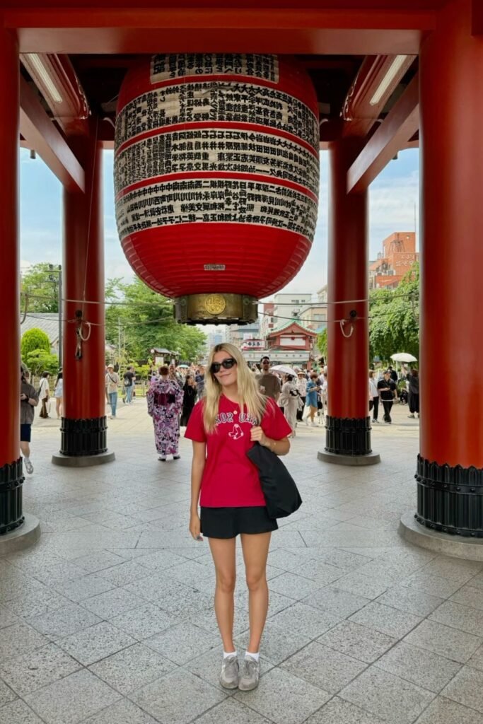 Red Graphic T Shirt + Black Shorts + Grey Sneakers