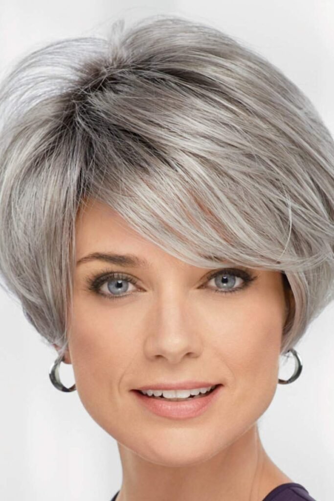 Rounded Silver Bob with Deep Side-Swept Bangs