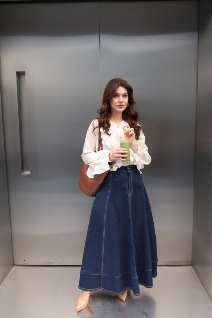 Ruffled White Blouse + Dark Wash A Line Denim Maxi Skirt + Tan Pumps + Brown Leather Tote Bag