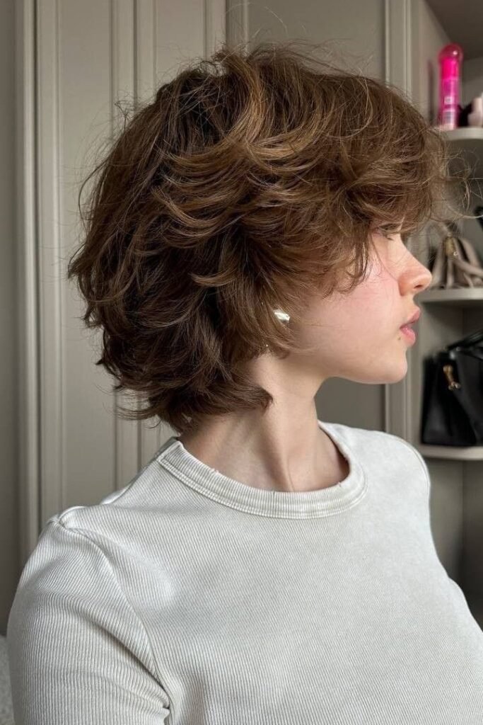 Shaggy Wolf Cut Bob with Heavy Layers and Curtain Bangs