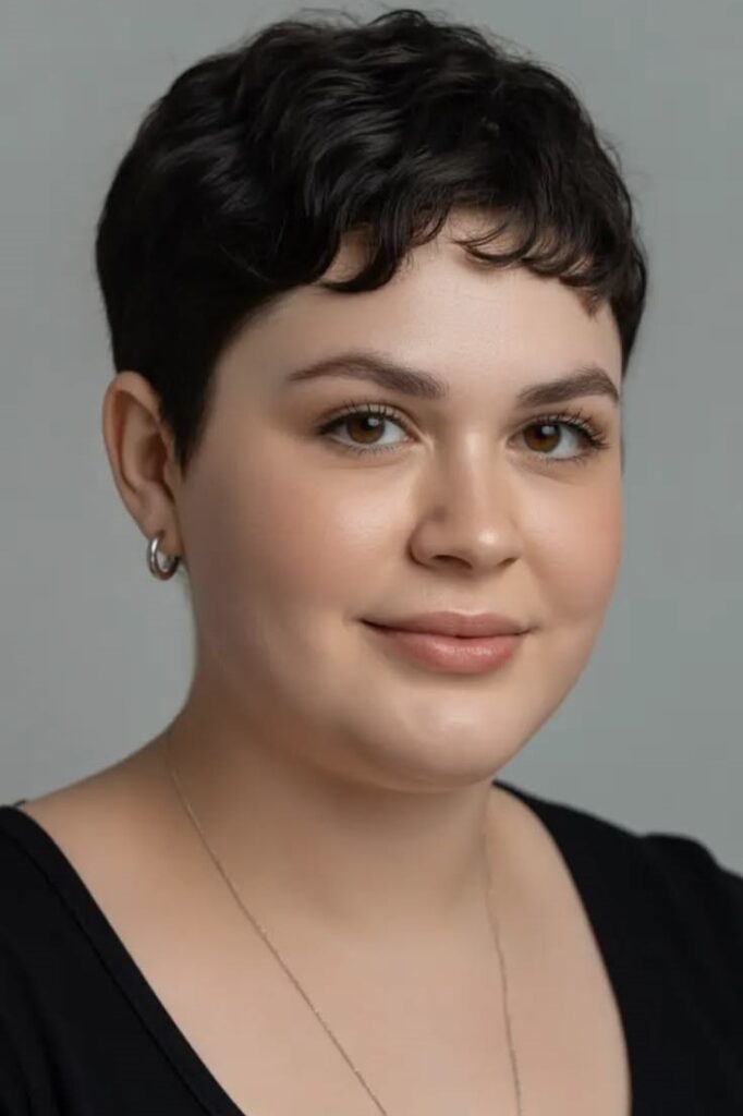24. Short Pixie Cut with Soft Dark Waves