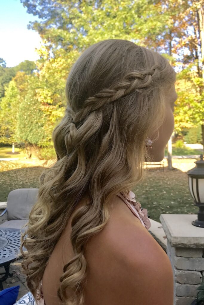 Side-Swept French Braid with Loose Spirals