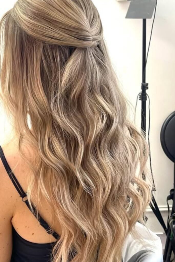 Simple Twisted Half-Up Hairstyle with Soft Long Waves