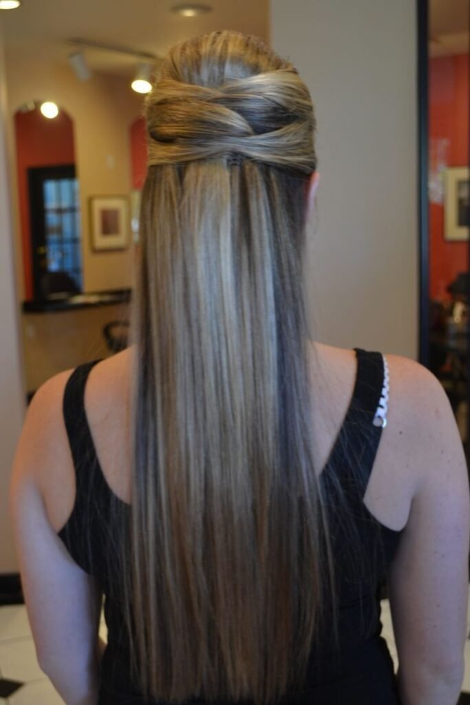 Sleek Half-Up Tucked Style with Straight Polished Hair