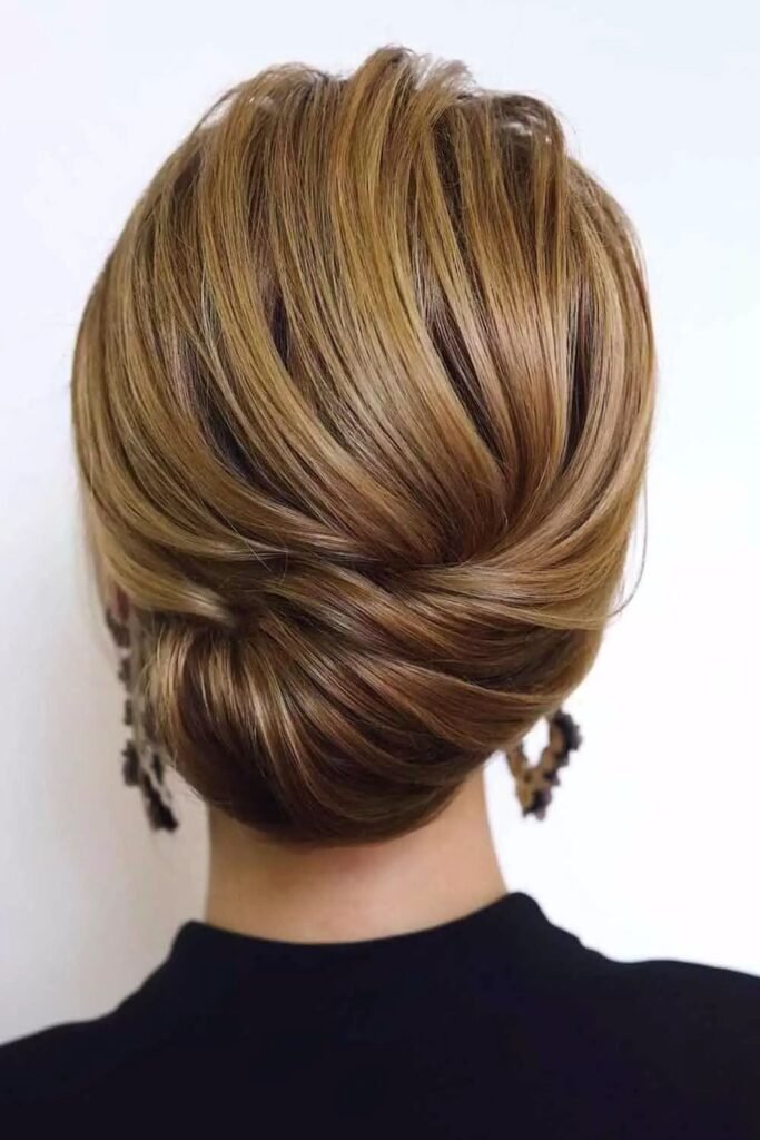 Sleek Low French Roll with Seamless Tapered Layers