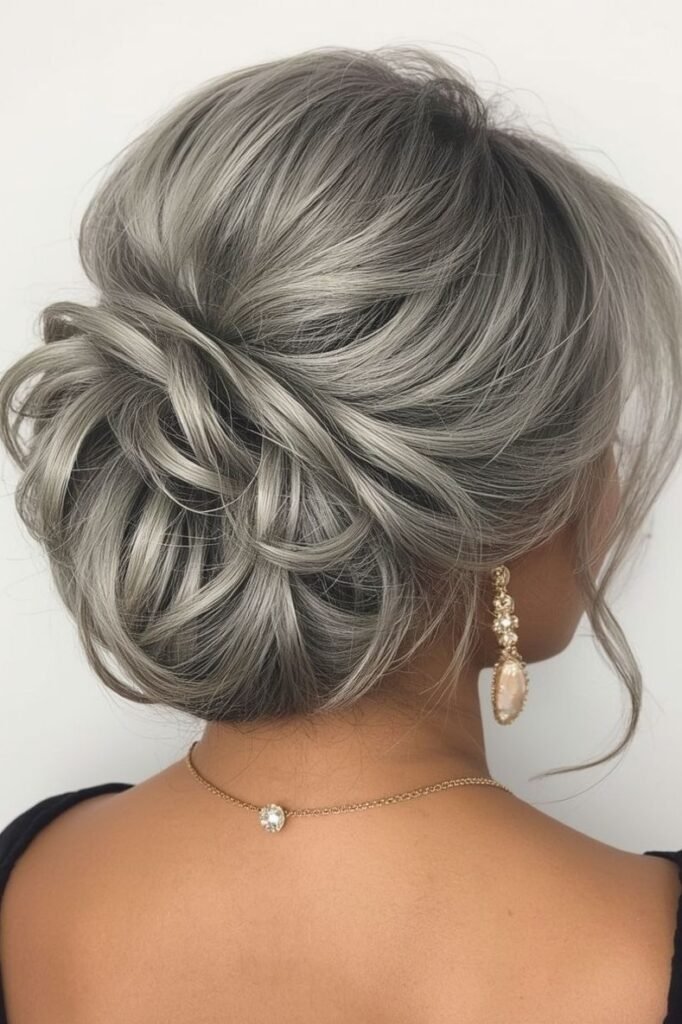 Sleek Voluminous Low Bun in Ash Blonde