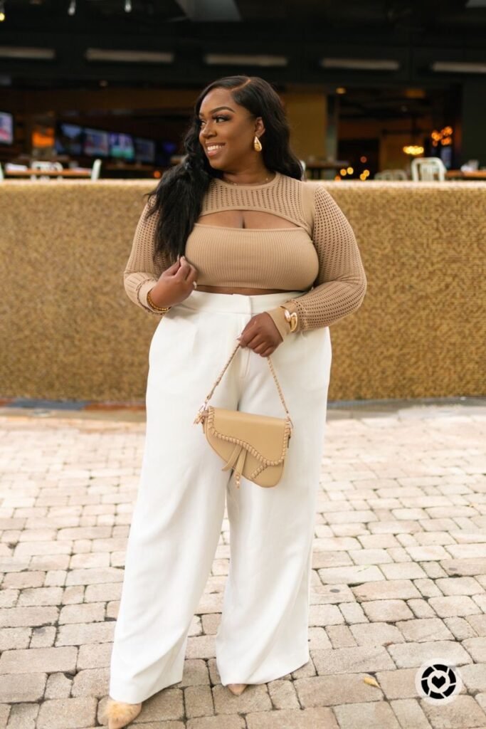 Tan Knit Long Sleeve Crop Top with Cutout + White High Waisted Pleated Trousers + Beige Furry Mules