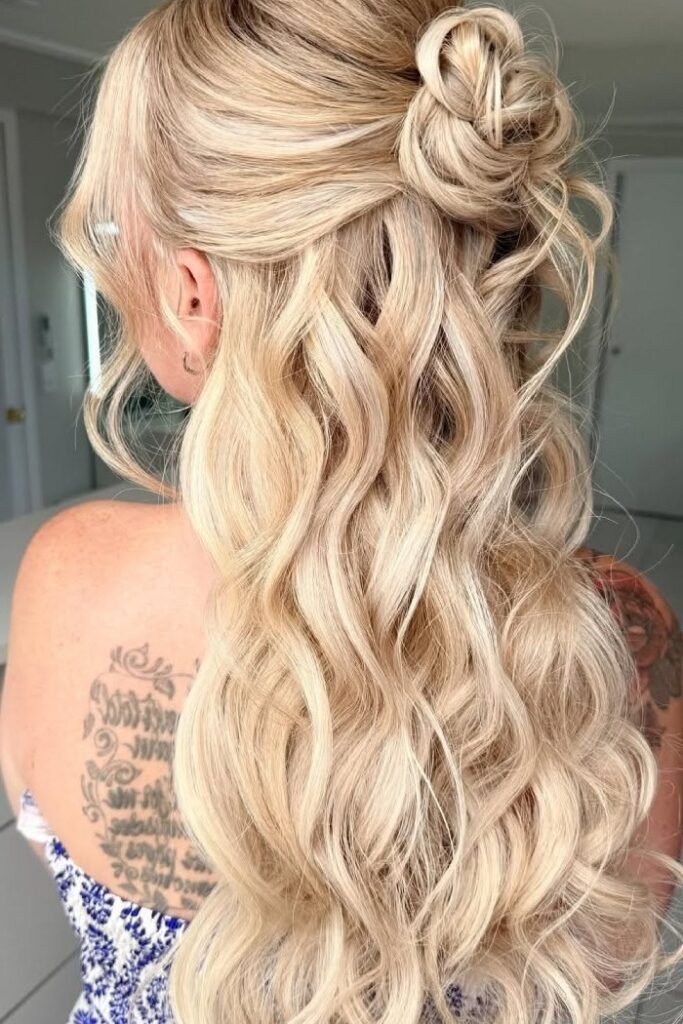 Voluminous Half-Up Messy Top Knot with Beachy Waves