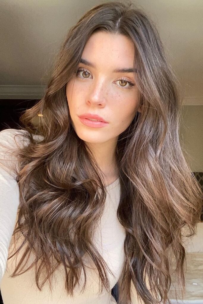 Voluminous Long Brown Curls with Subtle Highlights