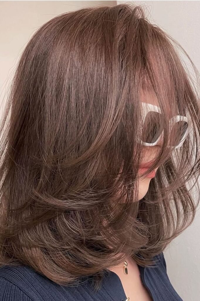 55. Warm Chestnut Brown Soft Layered Cut with Curtain Bangs