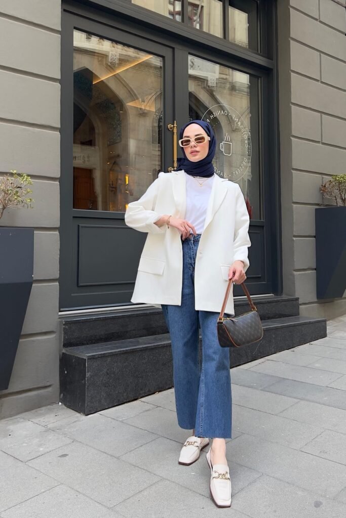 White Blazer + White T Shirt + Blue Flared Jeans + White Loafers