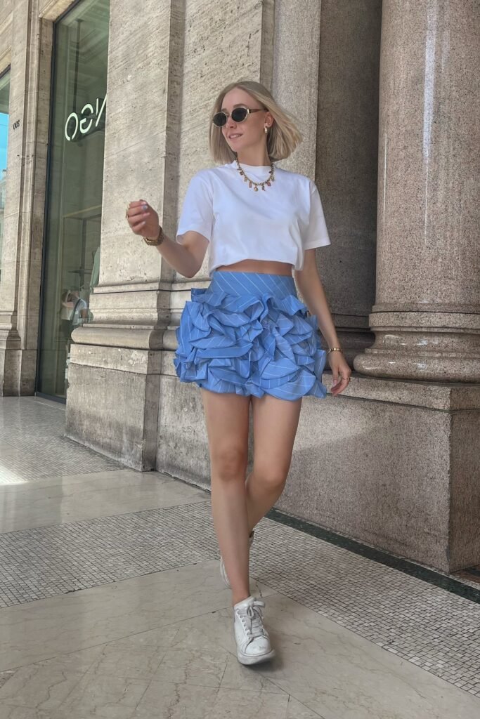 White Boxy Crop Tee + Blue Pinstripe Ruffled Mini Skirt + White High Top Sneakers