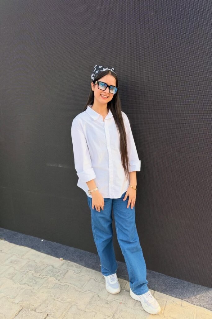 White Button Down Shirt + Medium Wash Straight Leg Jeans + White Sneakers