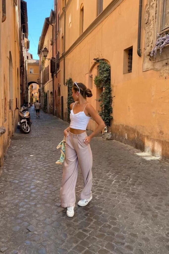 White Cropped Top + Light Pink Wide Leg Trousers + White Sneakers