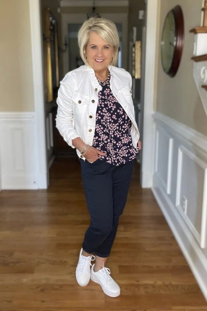 White Denim Jacket + Navy Floral Blouse + Navy Slim Pants + White Sneakers